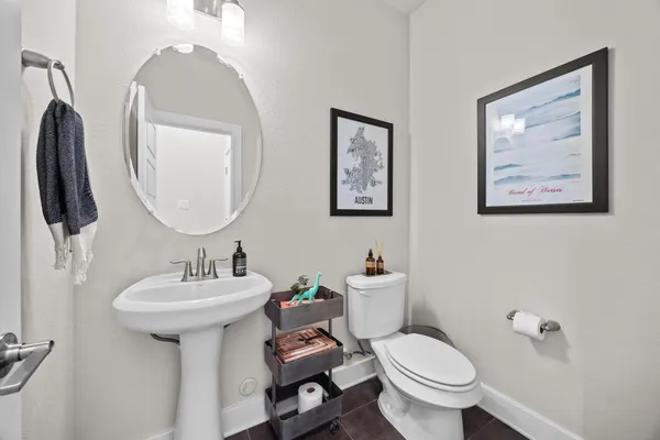 a view of a livingroom with furniture and a window