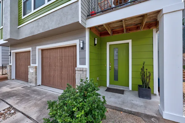 a view of a house with a door and a window