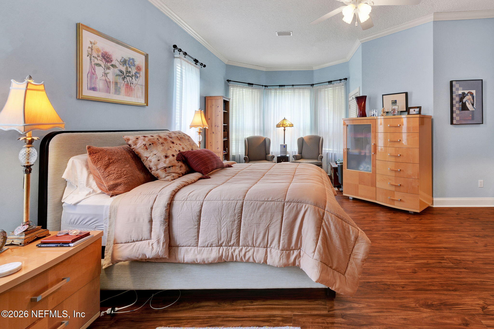 5950 West Shores Road Orange Park, FL 32003 - Photo 23 of 42 a bedroom with a bed and wooden floor
