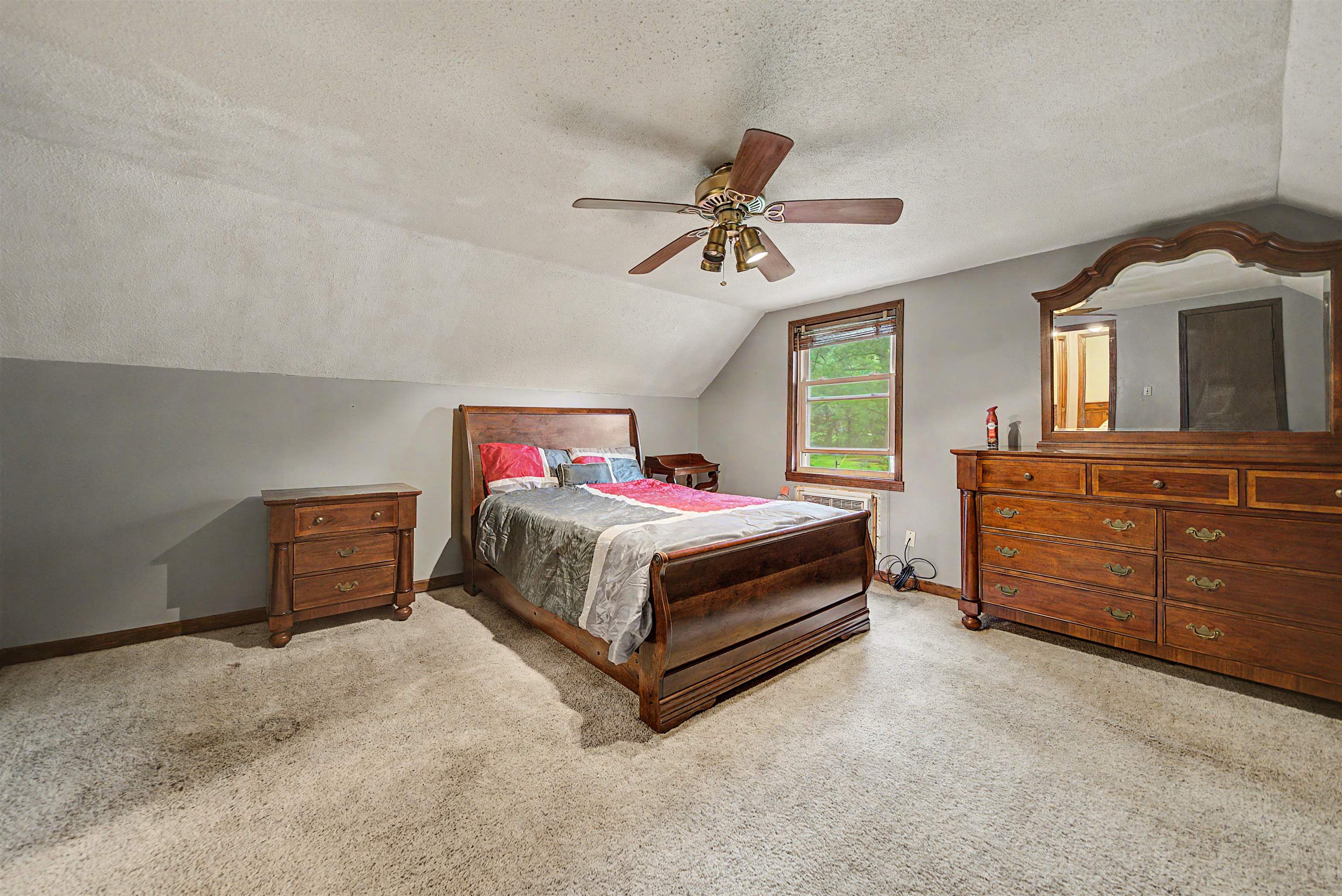 12 Baker Road Selmer, TN 38375 - Photo 28 of 28 a bedroom with a bed and a dresser