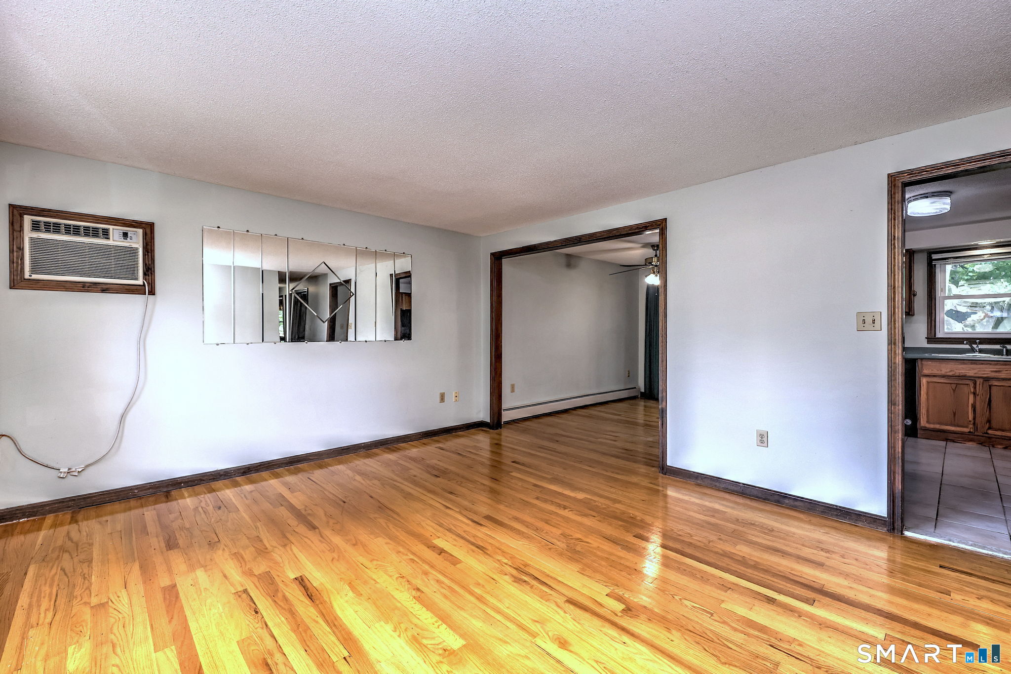 232 Anns Farm Road Hamden, CT 06518 - Photo 8 of 40 living room with just finished hardwood flooring