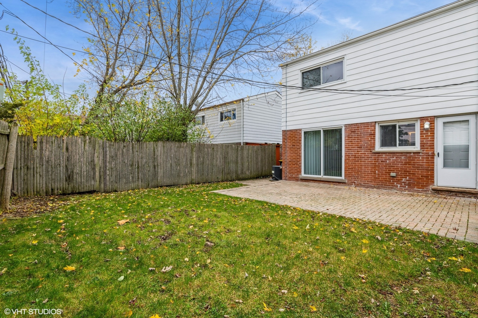 9349 Dee Road Des Plaines, IL 60016 - Photo 21 of 22 a view of a backyard with a house