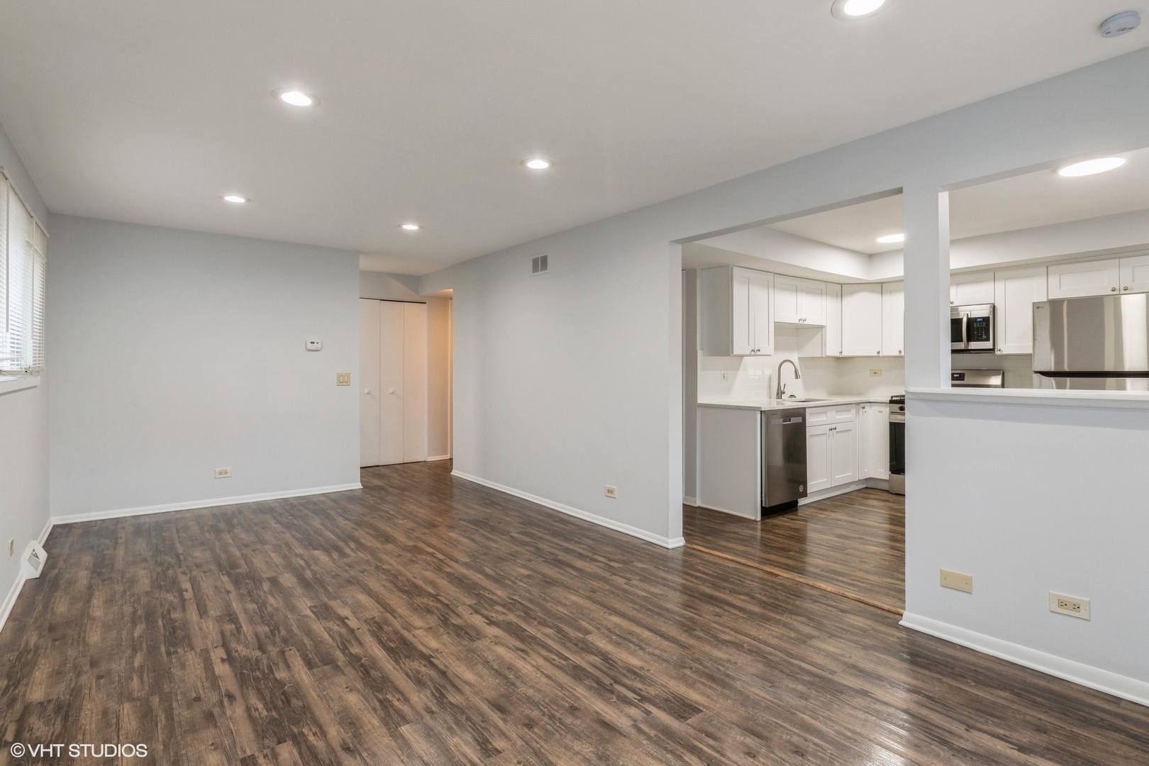 9349 Dee Road Des Plaines, IL 60016 - Photo 3 of 22 a view of kitchen with wooden floor