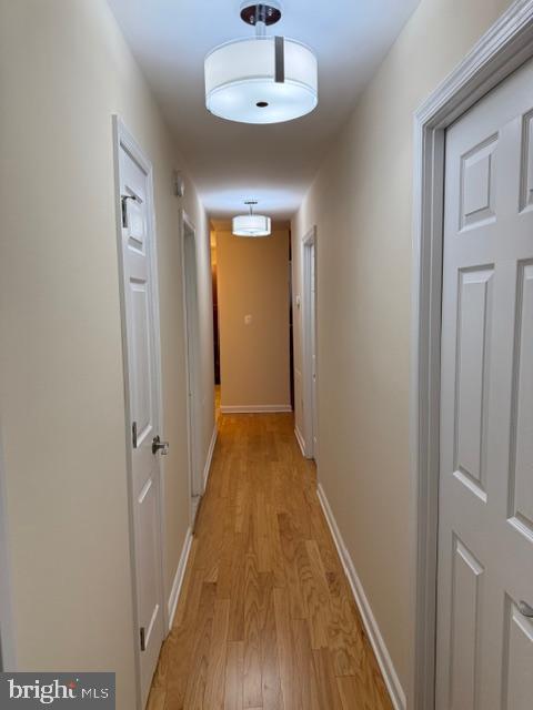 3822 Bel Pre Road, Unit 38223 Silver Spring, MD 20906 - Photo 17 of 31 a view of a hallway with wooden floor and a hallway