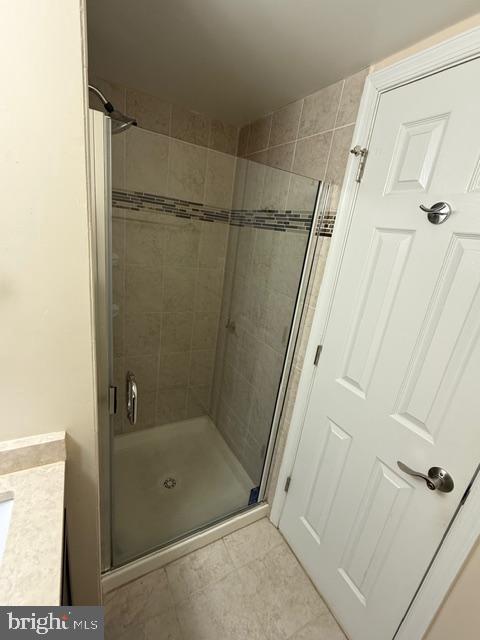 3822 Bel Pre Road, Unit 38223 Silver Spring, MD 20906 - Photo 30 of 31 a bathroom with a glass shower door