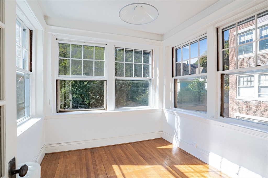 12 Gibbs Street, Unit 2 Brookline, MA 02446 - Photo 15 of 21 a view of an empty room with a window