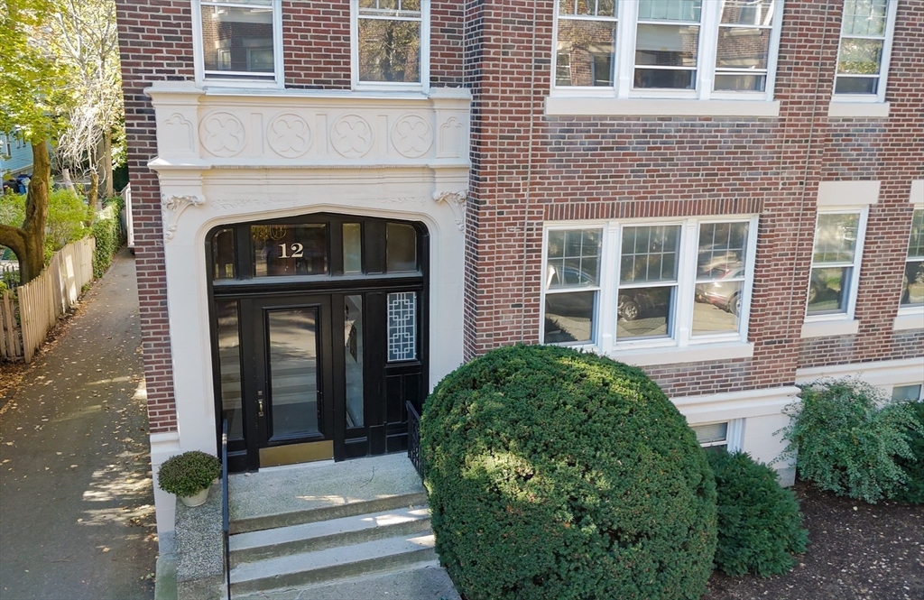 12 Gibbs Street, Unit 2 Brookline, MA 02446 - Photo 19 of 21 a front view of a house with garden