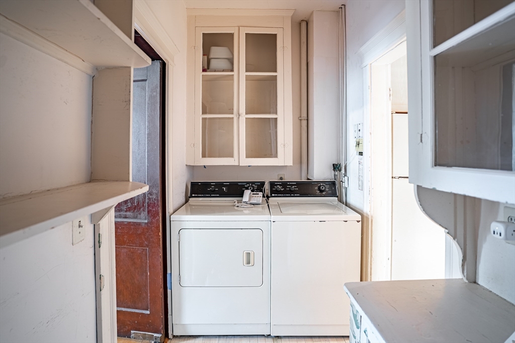 12 Gibbs Street, Unit 2 Brookline, MA 02446 - Photo 7 of 21 a view of a kitchen with a stove top oven