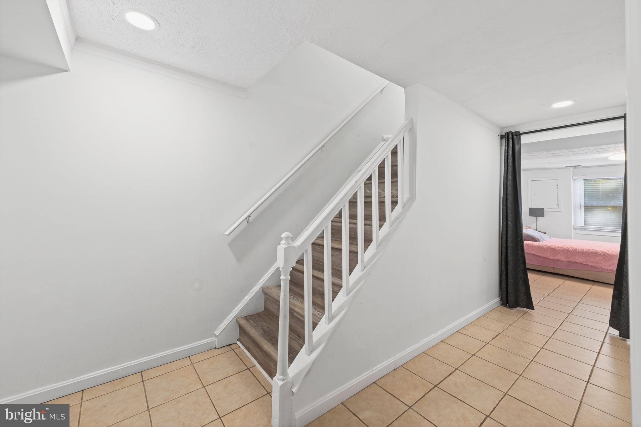 12462 Skipper Circle Woodbridge, VA 22192 - Photo 19 of 25 Inviting entryway with staircase charm.