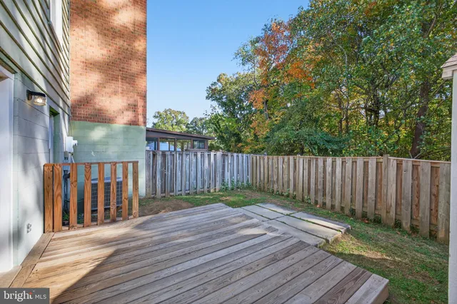 a balcony with wooden floor