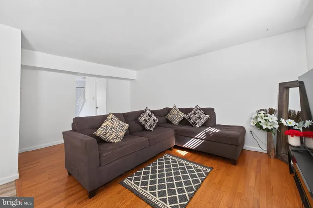 a living room with furniture and a couch