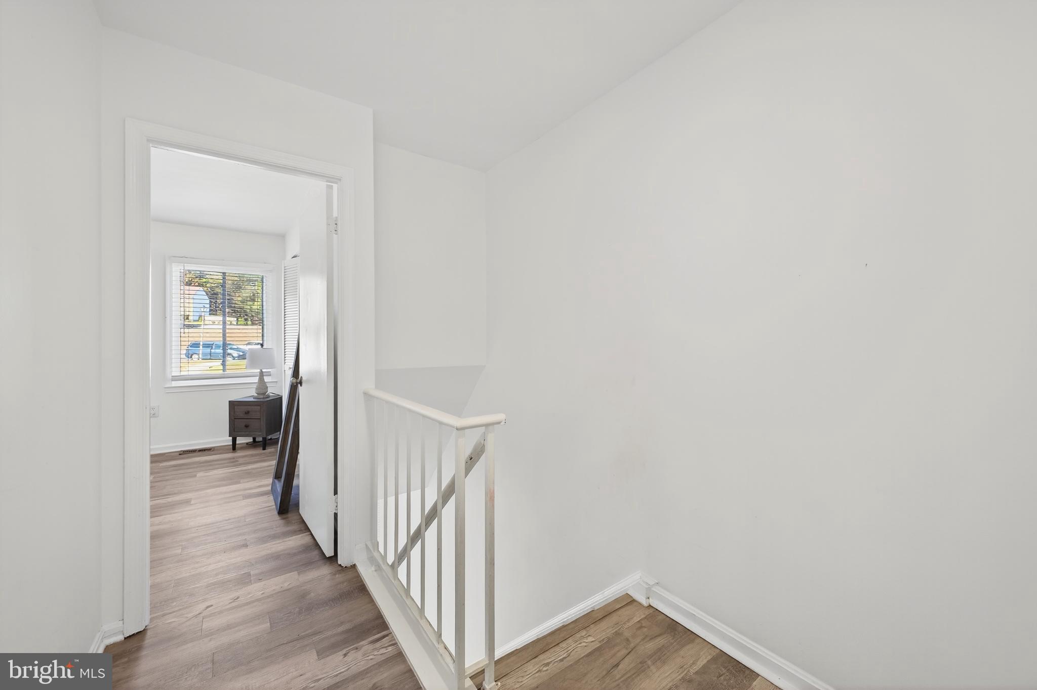 12462 Skipper Circle Woodbridge, VA 22192 - Photo 10 of 25 Bright and airy hallway with modern charm.