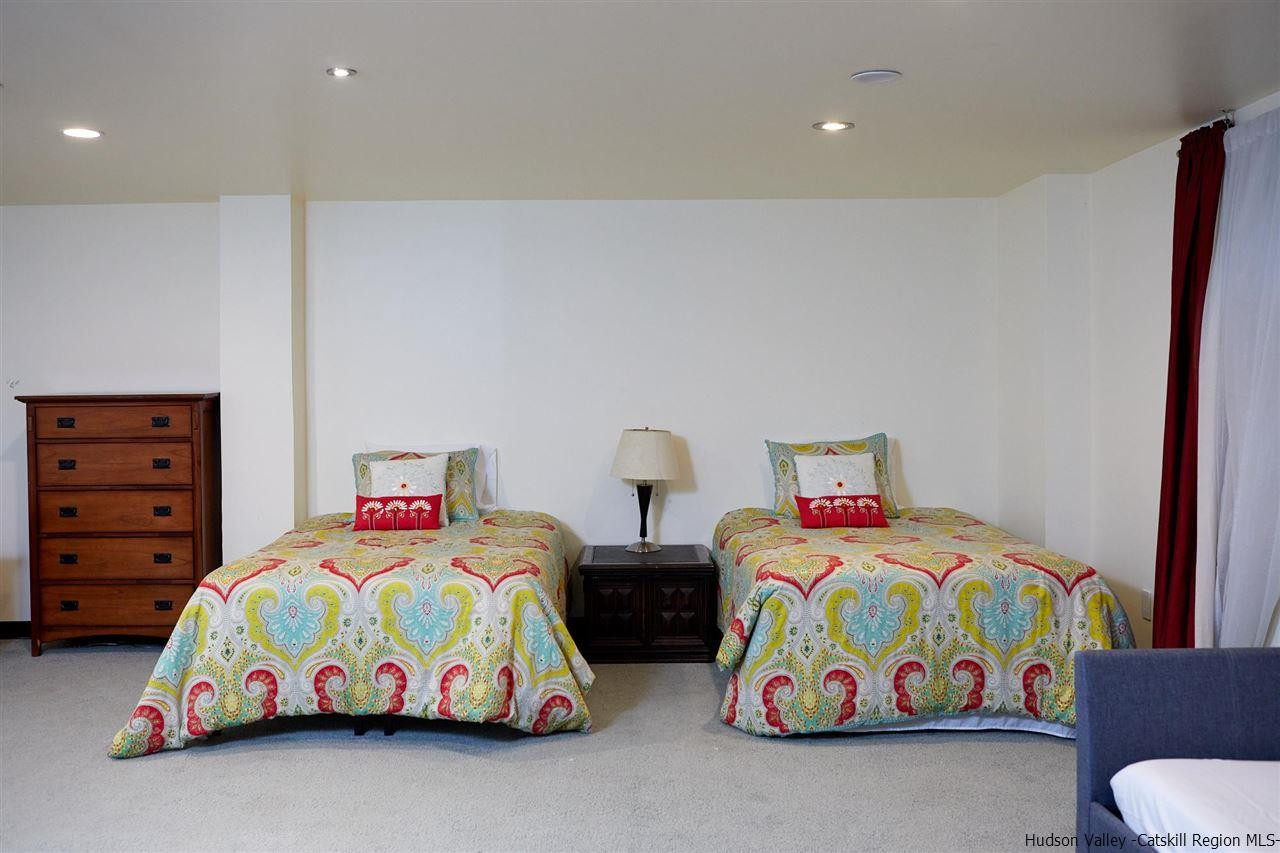 27 Westview Drive Wallkill, NY 12589 - Photo 27 of 35 a bedroom with two beds and a couch