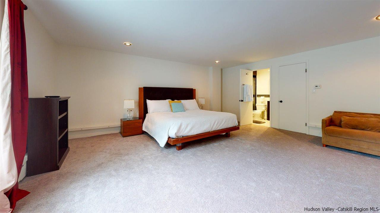 27 Westview Drive Wallkill, NY 12589 - Photo 28 of 35 a bedroom with a bed and a couch