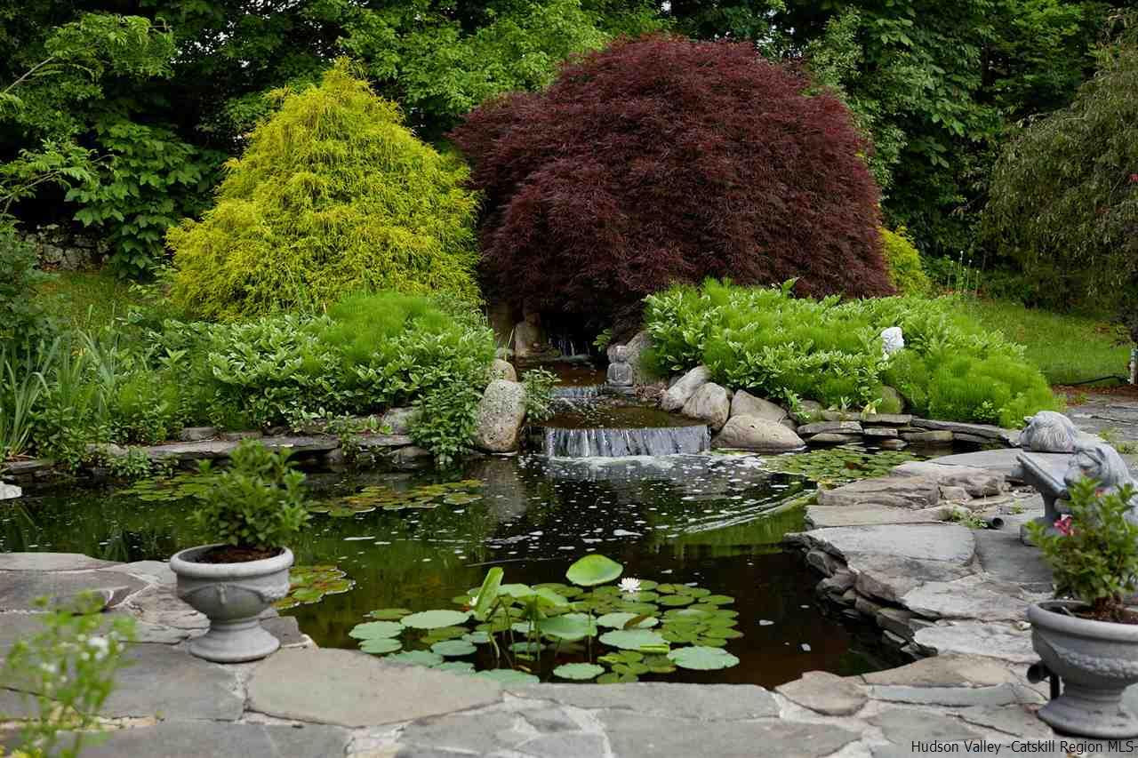 27 Westview Drive Wallkill, NY 12589 - Photo 30 of 35 a view of a garden with sitting area