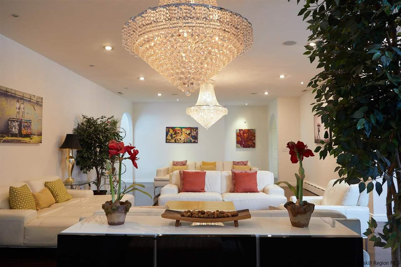 27 Westview Drive Wallkill, NY 12589 - Photo 4 of 35 a kitchen with a table and chairs in it