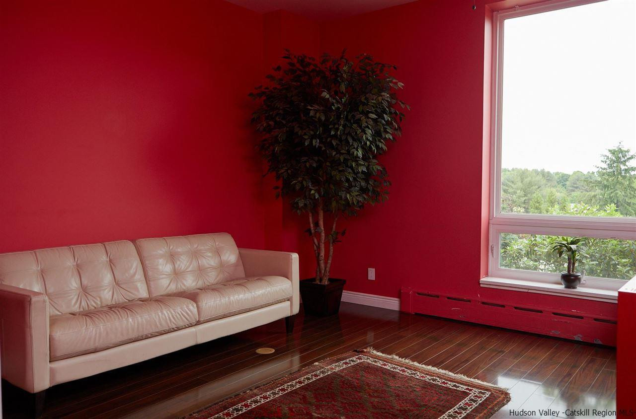 27 Westview Drive Wallkill, NY 12589 - Photo 7 of 35 a living room with furniture a window and a potted plant