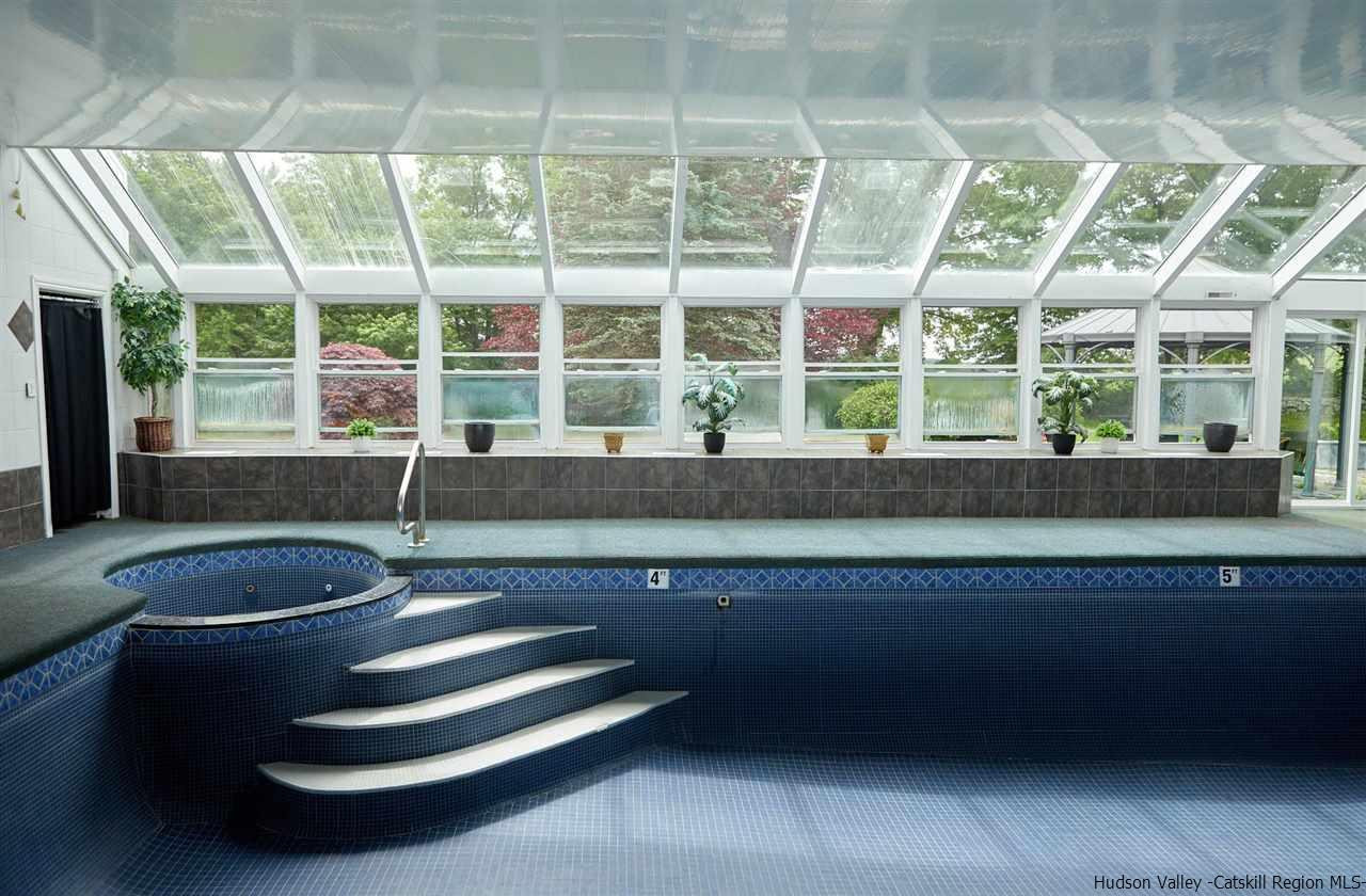 27 Westview Drive Wallkill, NY 12589 - Photo 9 of 35 a bath tub sitting next to a window