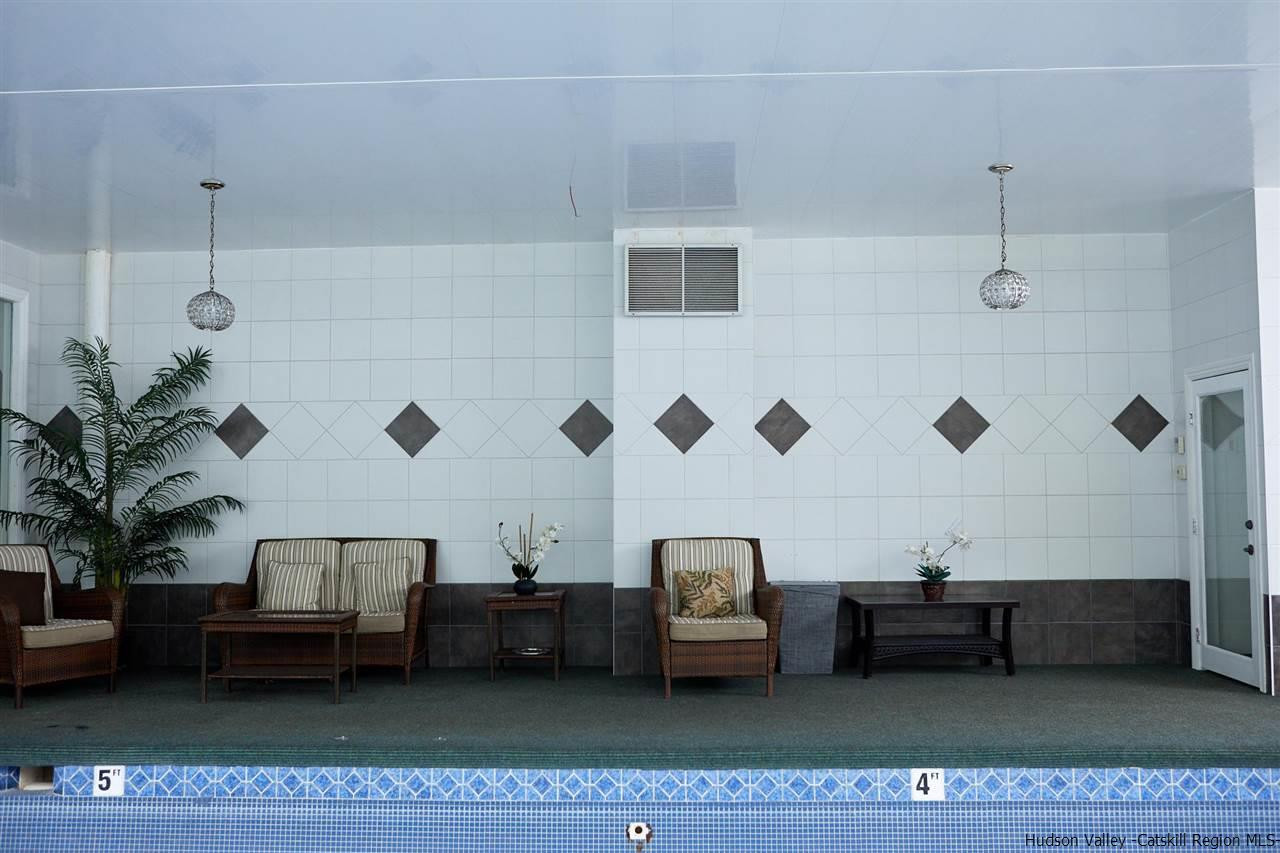 27 Westview Drive Wallkill, NY 12589 - Photo 10 of 35 a living room with furniture and a large window