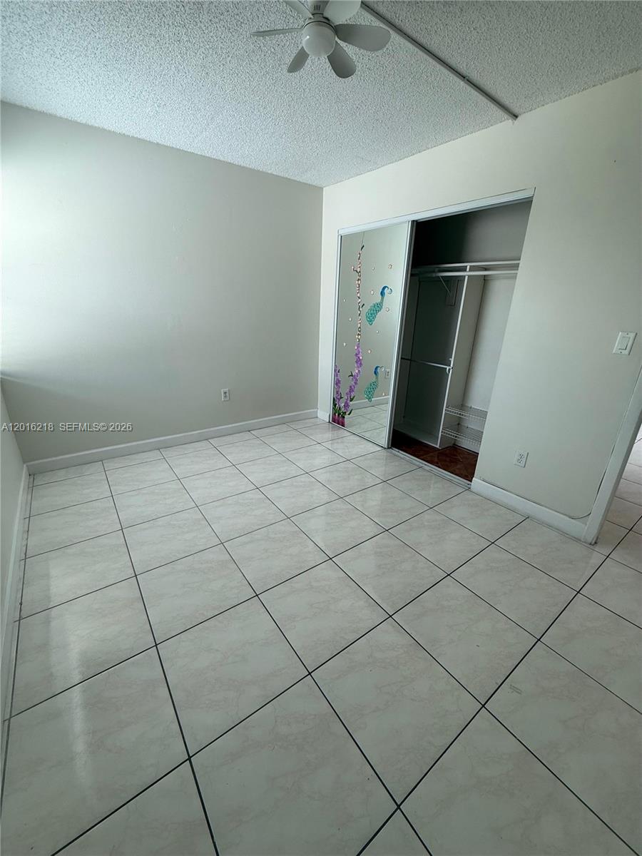 9321 Southwest 4th Street, Unit 230C Miami, FL 33174 - Photo 35 of 37 a view of an empty room and a window