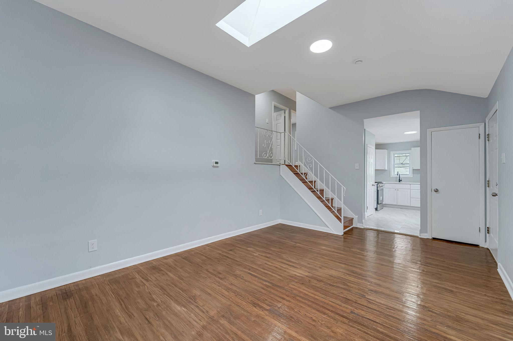 2405 North Cuthbert Drive Lindenwold, NJ 08021 - Photo 12 of 31 a view of an empty room with wooden floor