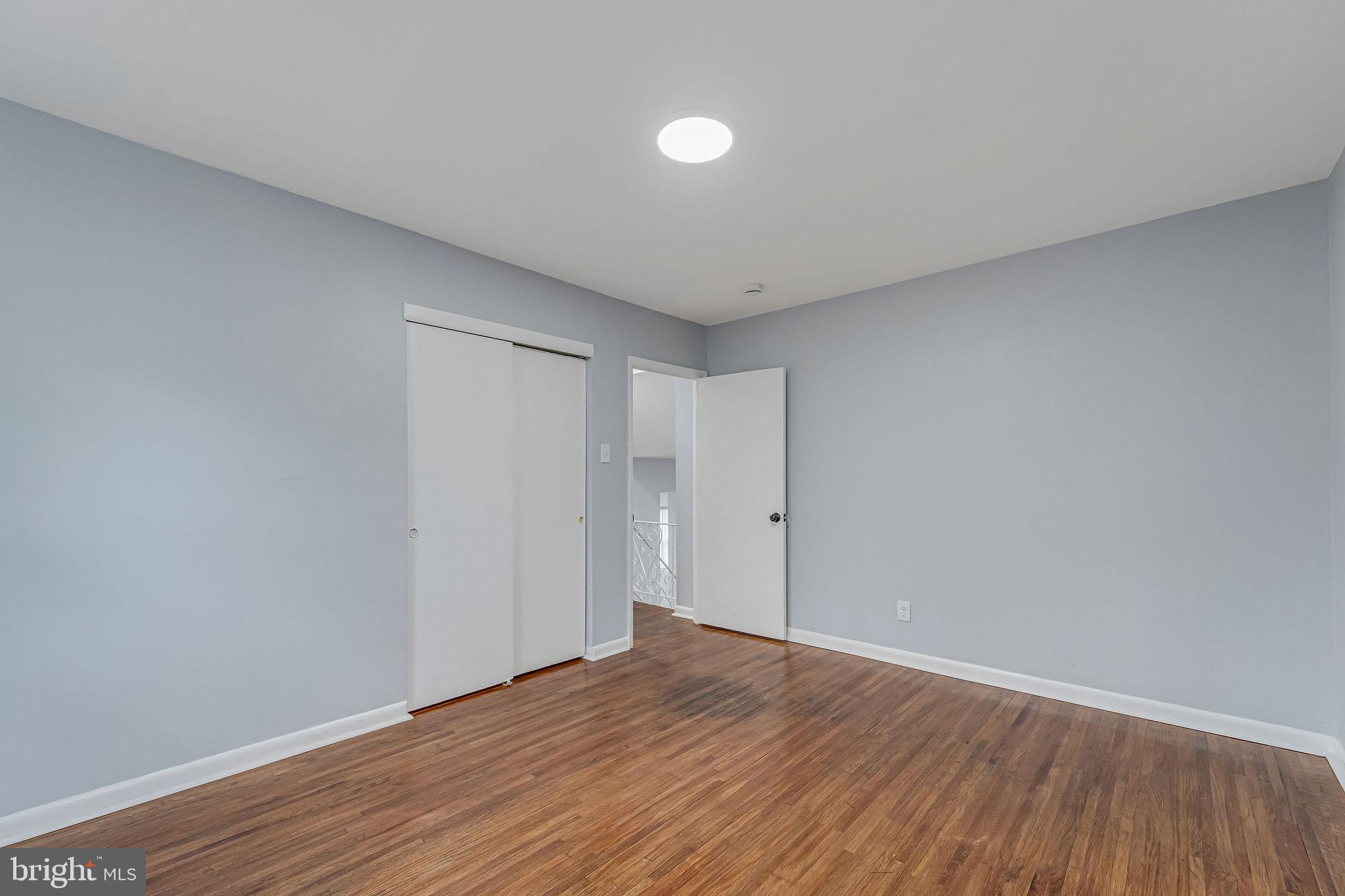 2405 North Cuthbert Drive Lindenwold, NJ 08021 - Photo 14 of 31 a view of an empty room with wooden floor