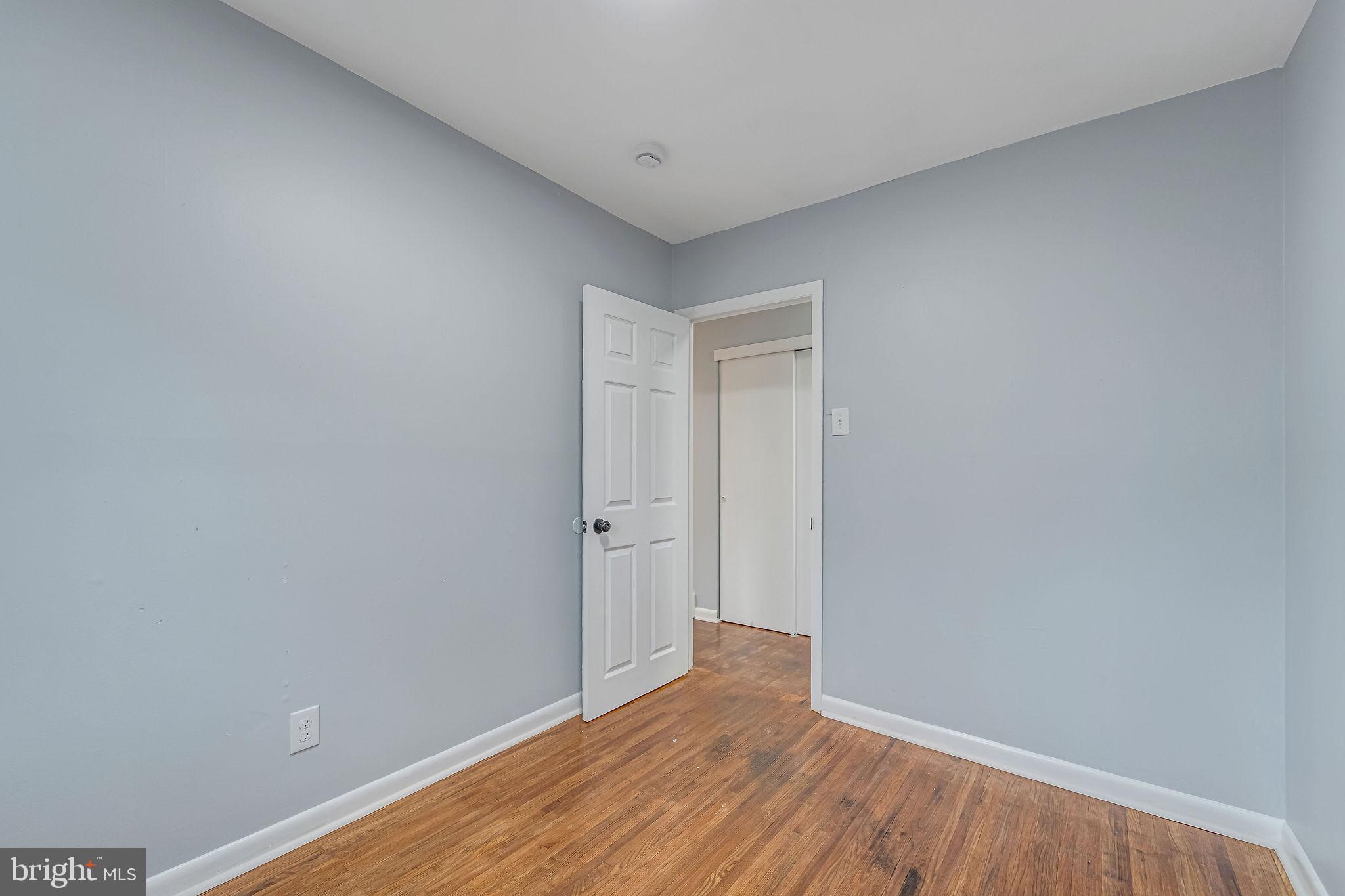 2405 North Cuthbert Drive Lindenwold, NJ 08021 - Photo 15 of 31 a view of an empty room with wooden floor