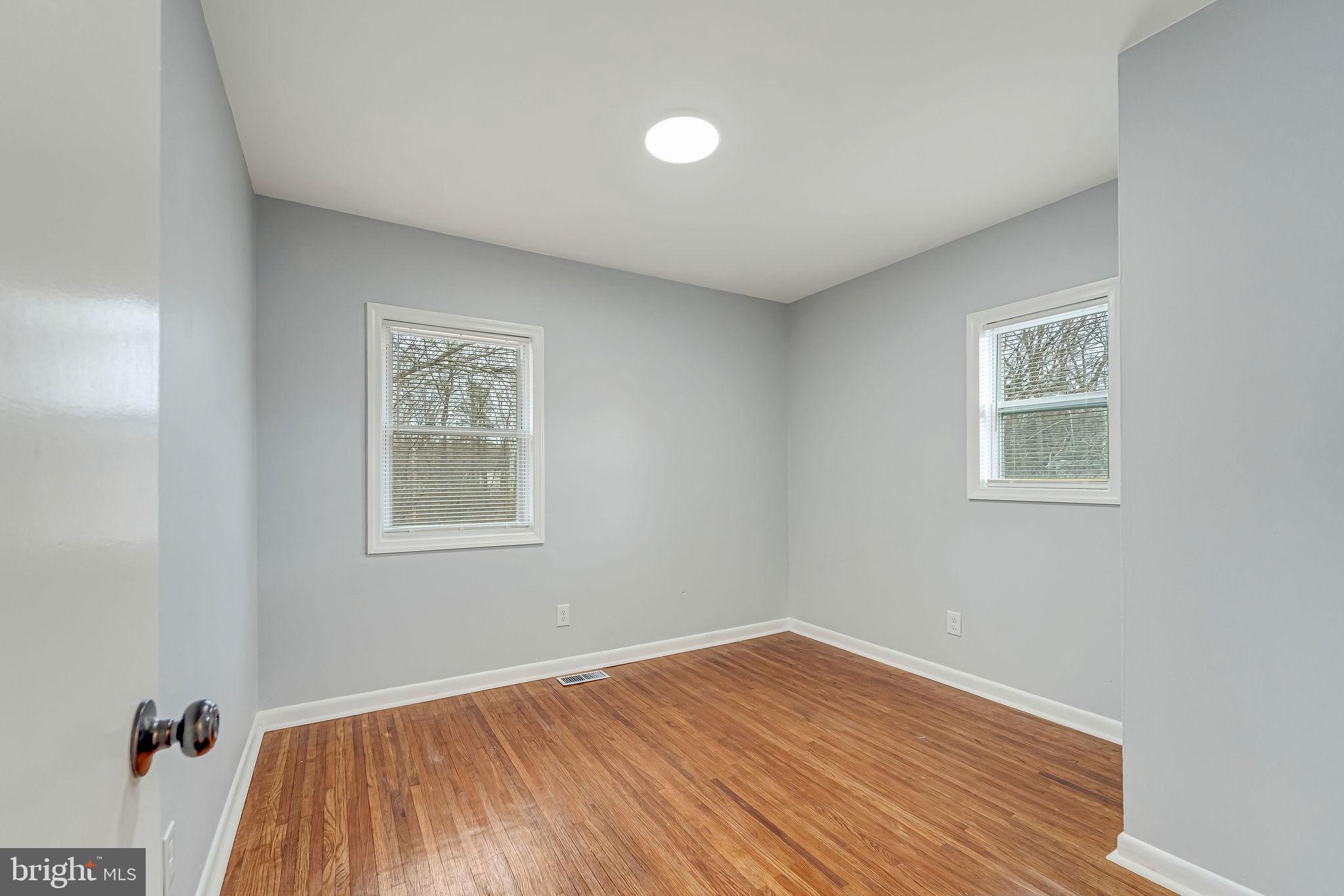2405 North Cuthbert Drive Lindenwold, NJ 08021 - Photo 17 of 31 a view of a room with wooden floor and windows