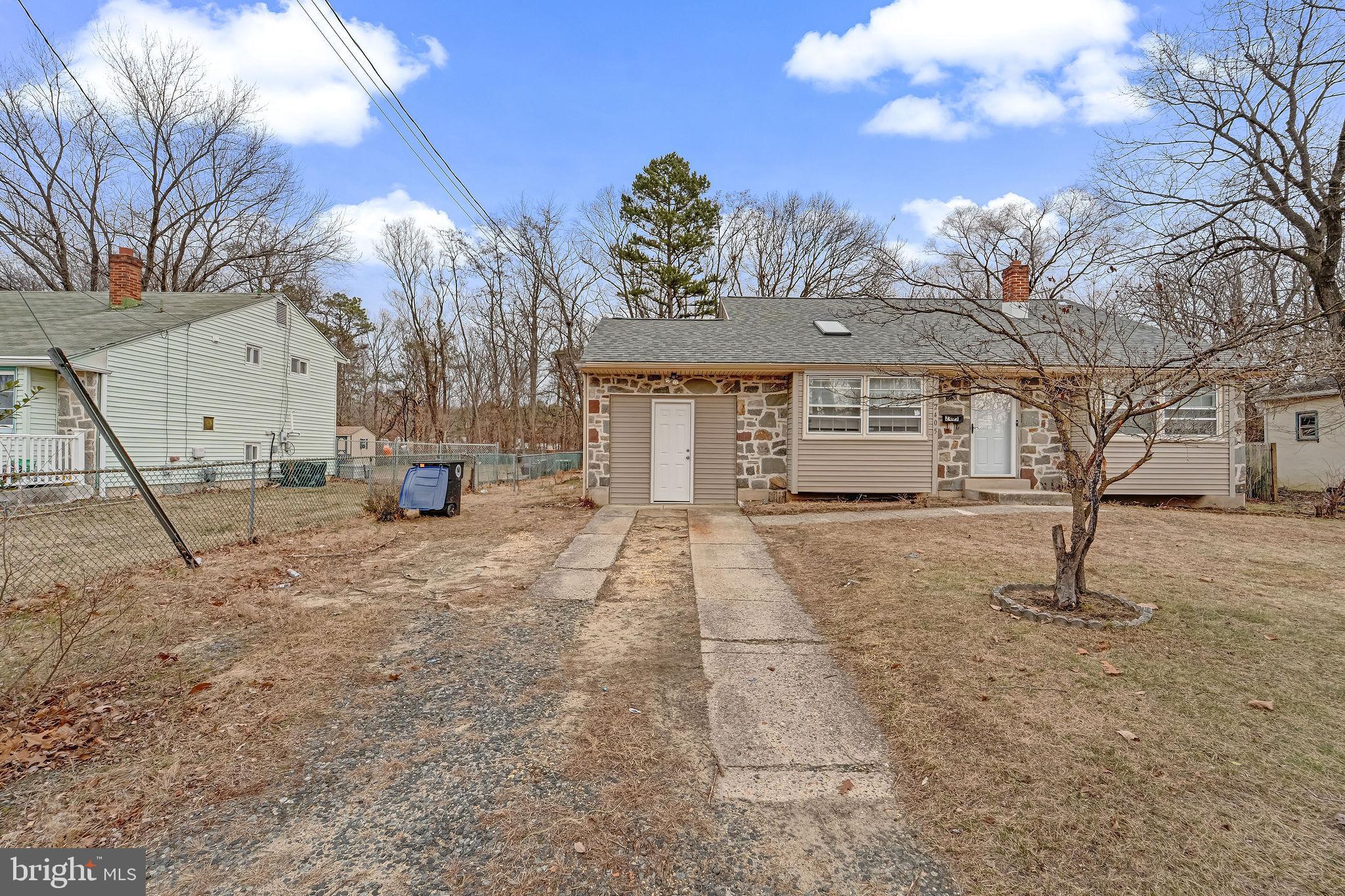 2405 North Cuthbert Drive Lindenwold, NJ 08021 - Photo 2 of 31 a front view of a house with a yard