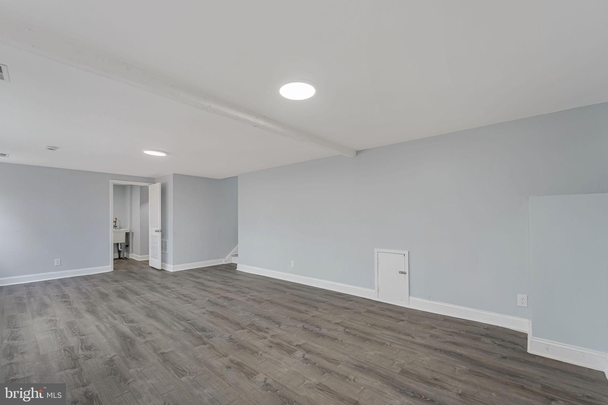 2405 North Cuthbert Drive Lindenwold, NJ 08021 - Photo 21 of 31 a view of an empty room with wooden floor