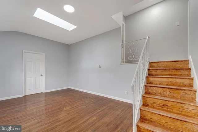 a view of entryway with wooden floor