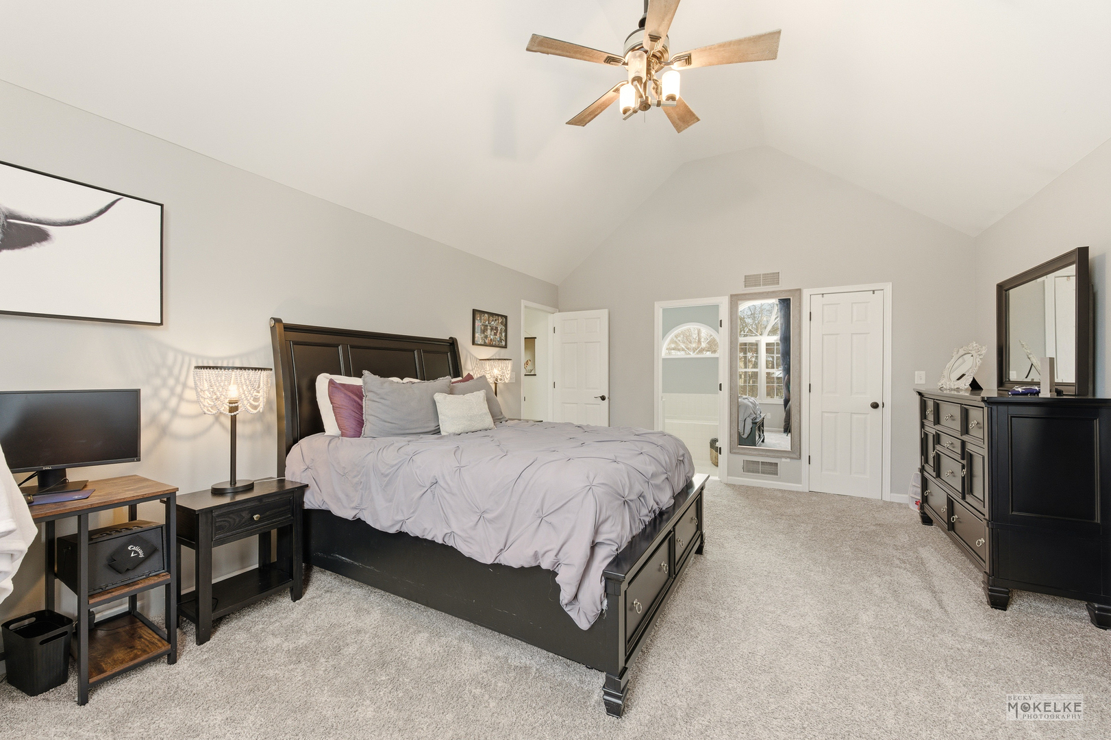 777 Debbie Lane Sandwich, IL 60548 - Photo 18 of 39 a spacious bedroom with a bed and a flat screen tv