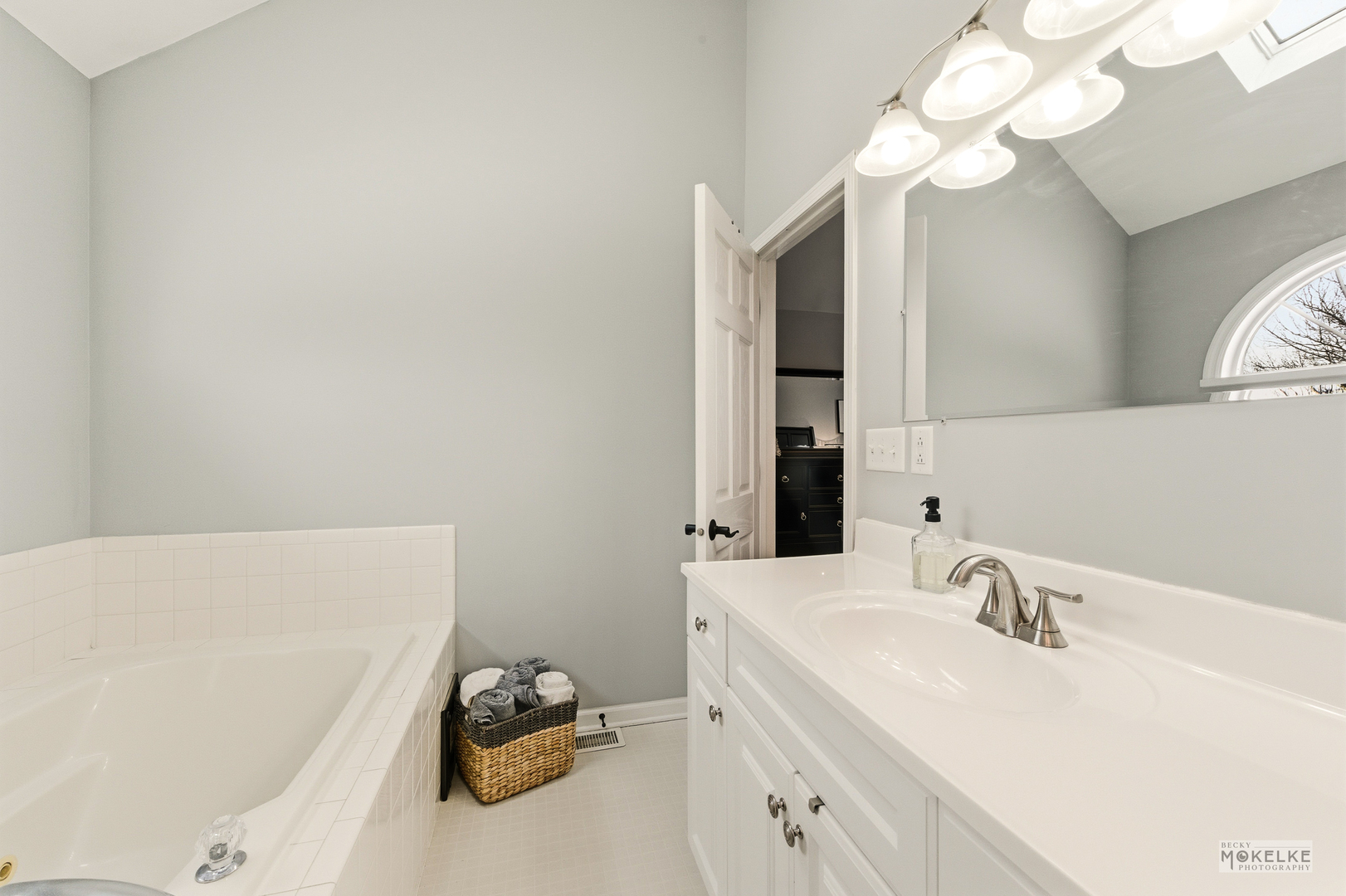 777 Debbie Lane Sandwich, IL 60548 - Photo 20 of 39 a bathroom with a sink and a mirror
