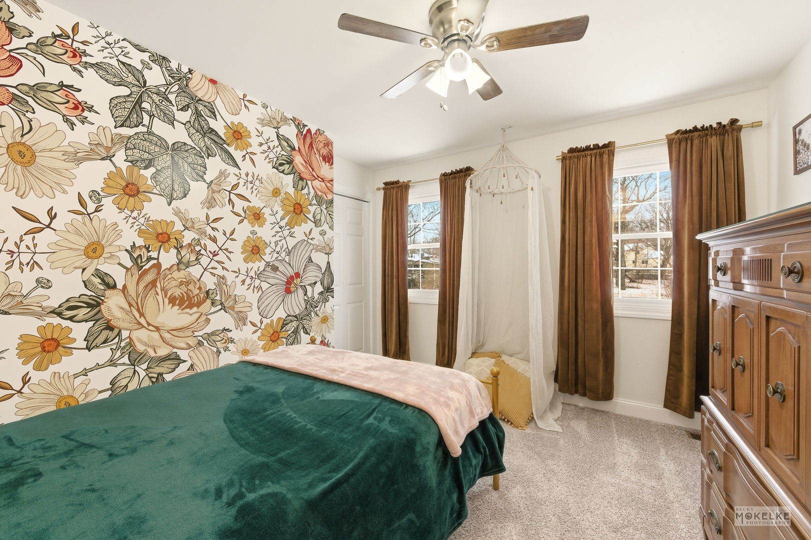 777 Debbie Lane Sandwich, IL 60548 - Photo 22 of 39 a bedroom with a large bed and a chandelier