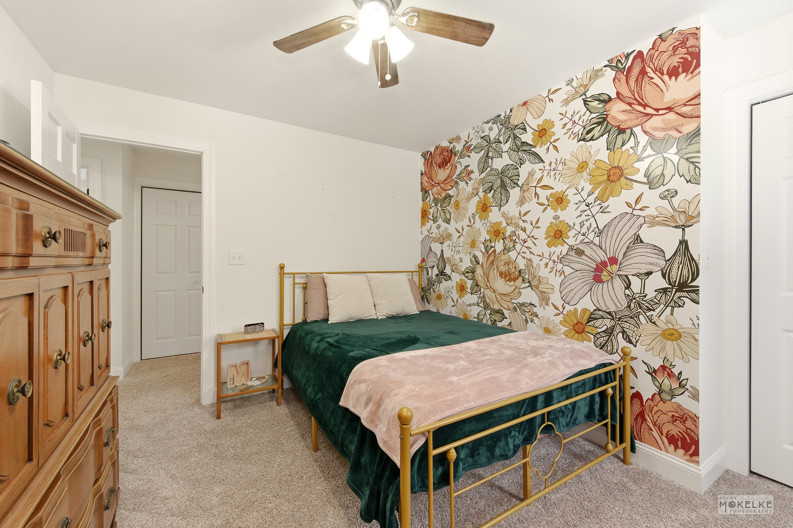 777 Debbie Lane Sandwich, IL 60548 - Photo 23 of 39 a bedroom with a bed and a chandelier