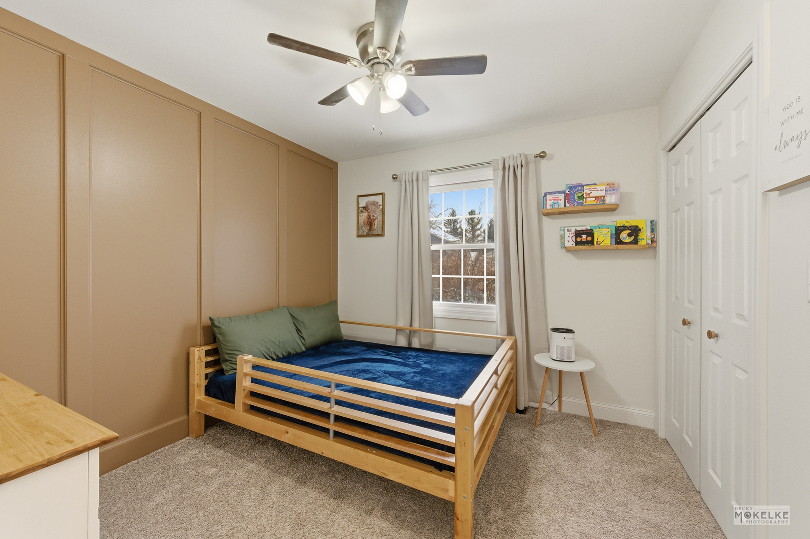 777 Debbie Lane Sandwich, IL 60548 - Photo 27 of 39 a bedroom with a bed and a chandelier