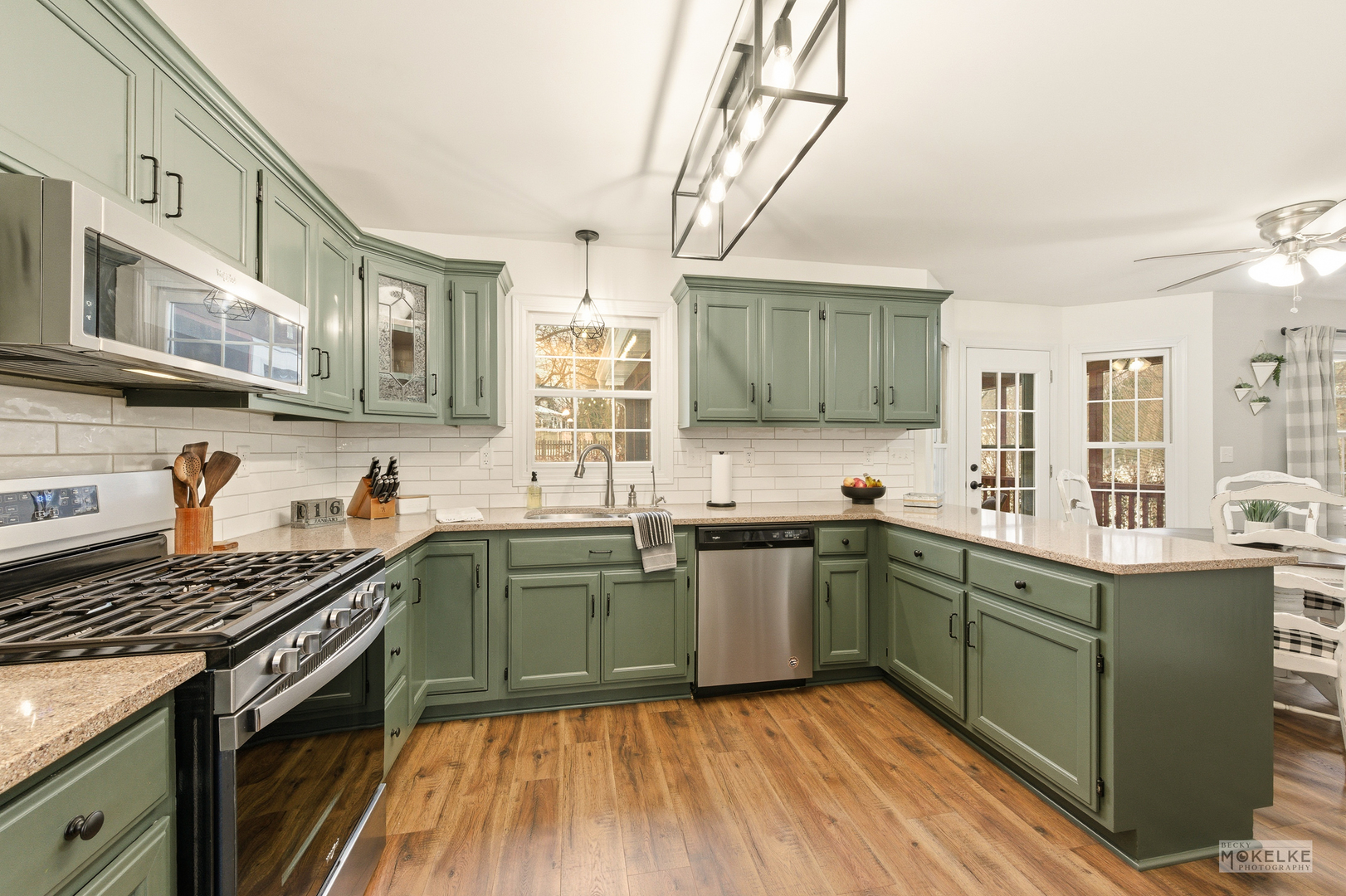 777 Debbie Lane Sandwich, IL 60548 - Photo 8 of 39 a kitchen with stainless steel appliances granite countertop a stove and cabinets