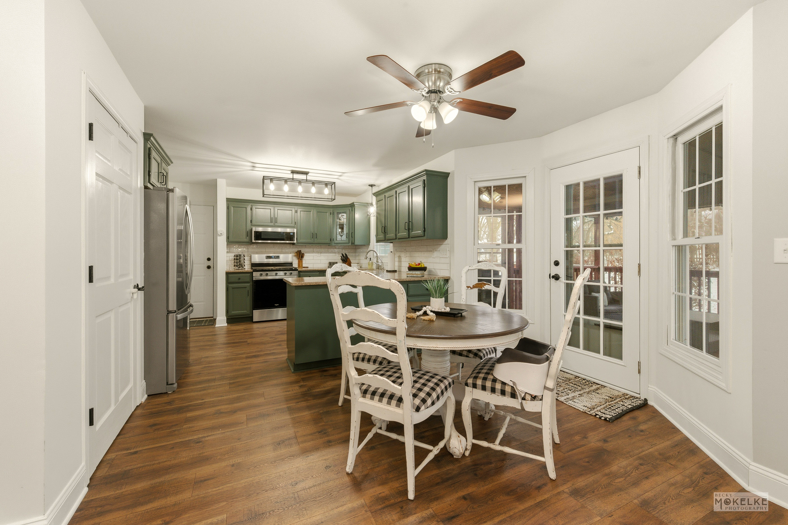 777 Debbie Lane Sandwich, IL 60548 - Photo 10 of 39 a view of a dining room with furniture window and wooden floor