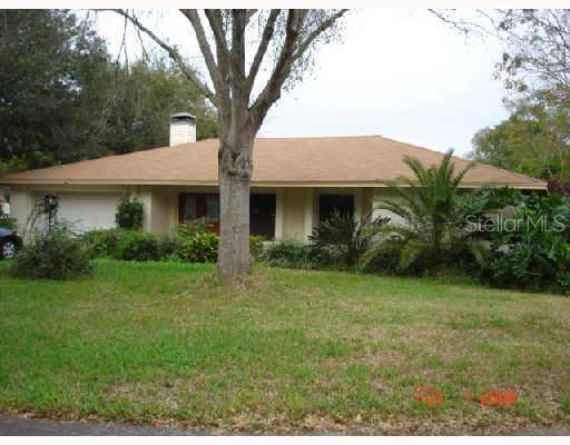 2045 Roxburgh Court Lakeland, FL 33813 - Photo 1 of 1 a front view of a house with a garden