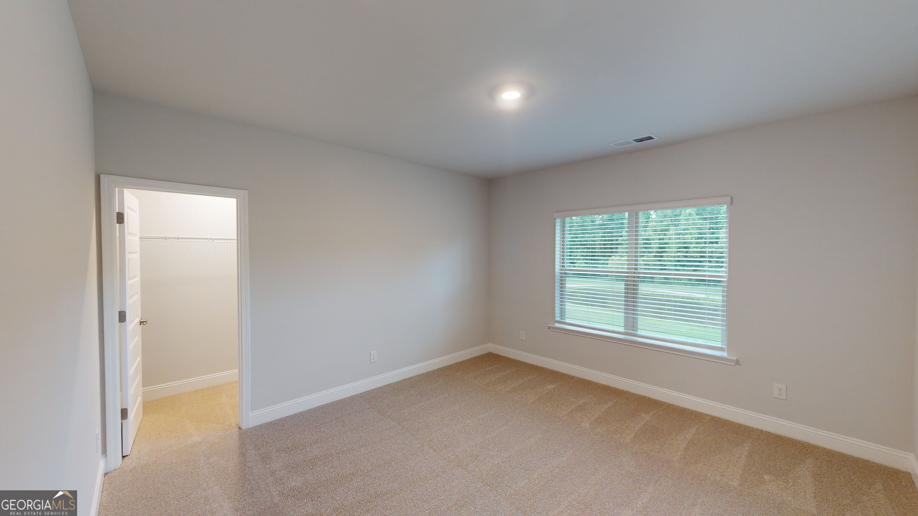 363 Eagle Ridge Road Macon, GA 31216 - Photo 29 of 32 an empty room with a window