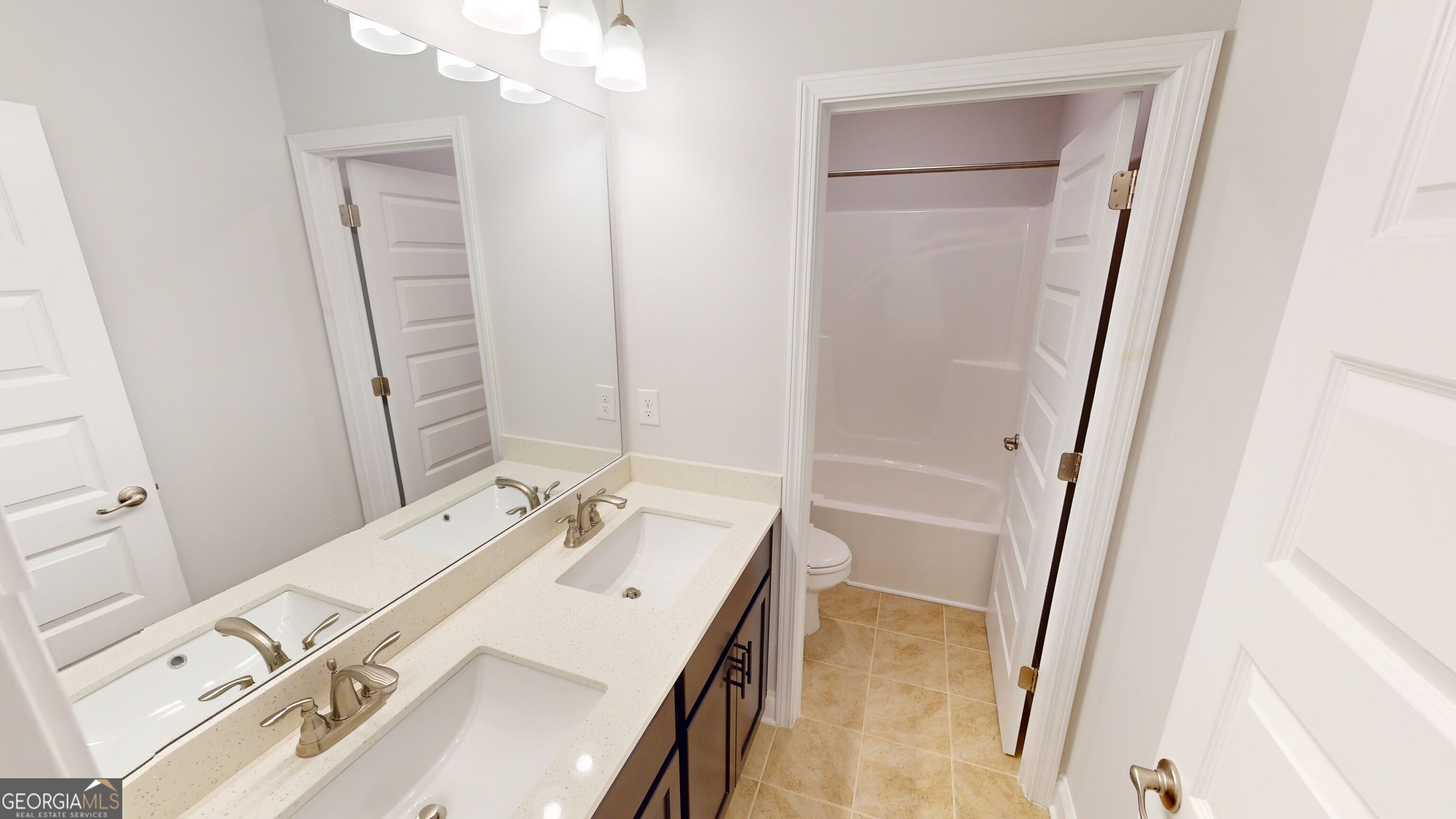 363 Eagle Ridge Road Macon, GA 31216 - Photo 30 of 32 a bathroom with a sink a vanity and a mirror