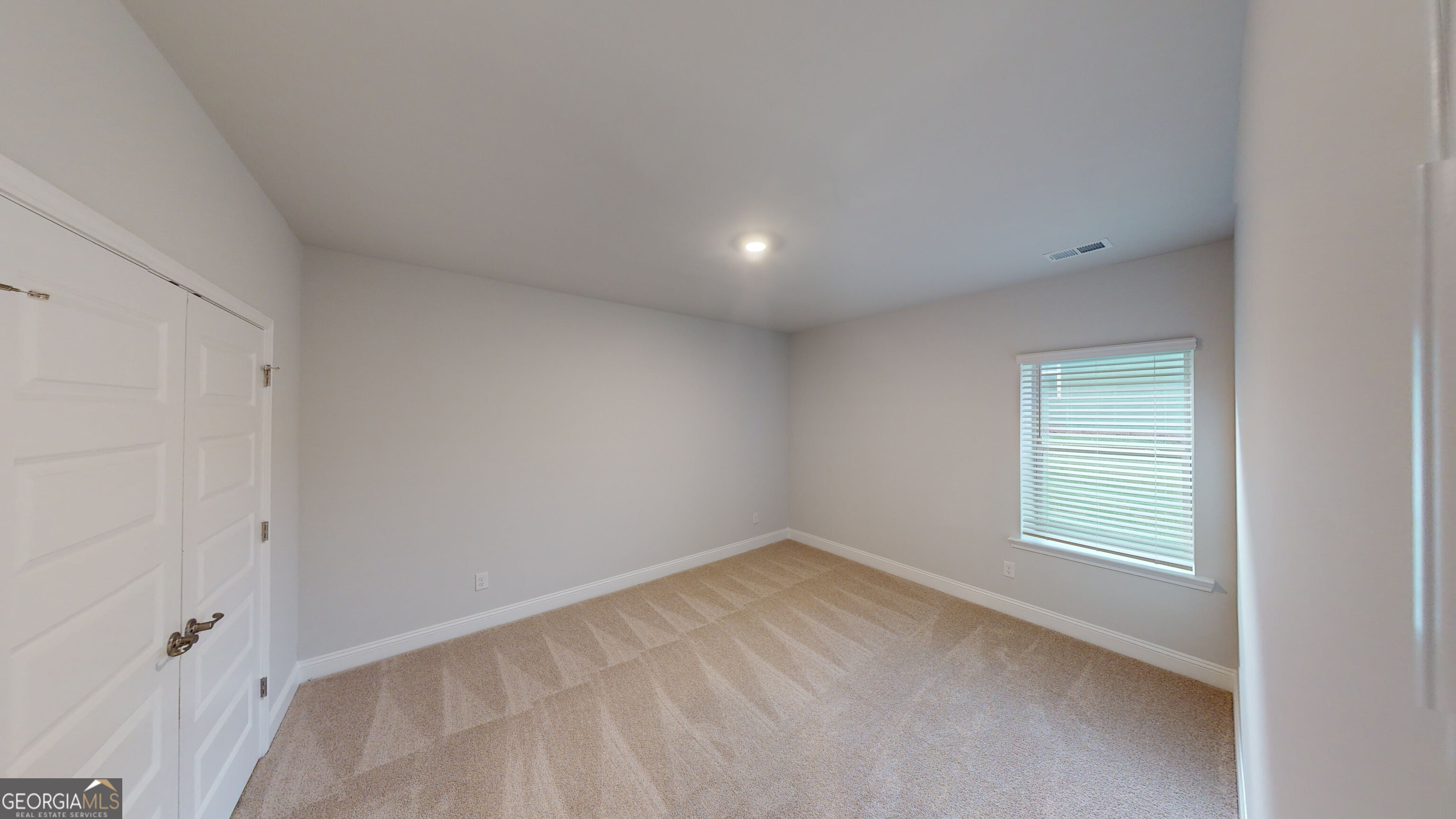 363 Eagle Ridge Road Macon, GA 31216 - Photo 32 of 32 a view of an empty room with a window