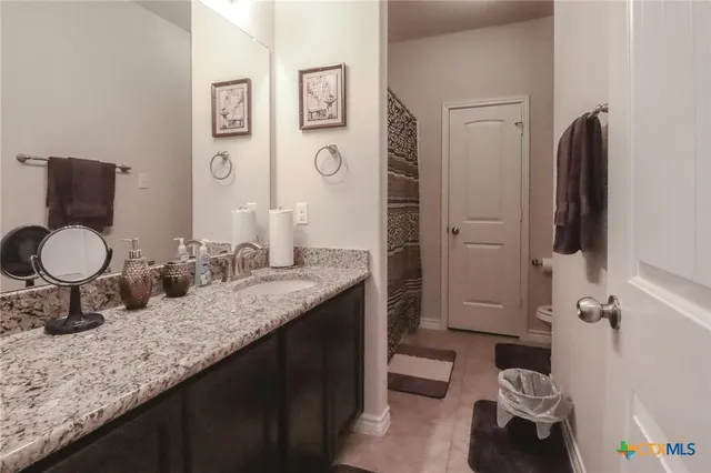 a view of a workspace with furniture