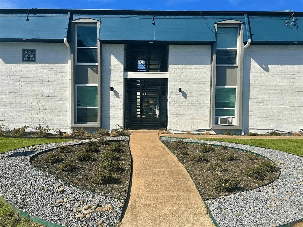 3627 Almazan Drive, Unit 117 Dallas, TX 75220 - Photo 1 of 6 a house view with a backyard space