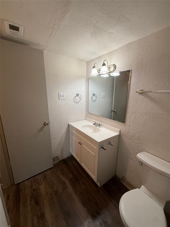 3627 Almazan Drive, Unit 117 Dallas, TX 75220 - Photo 4 of 6 a utility room with a washer and dryer