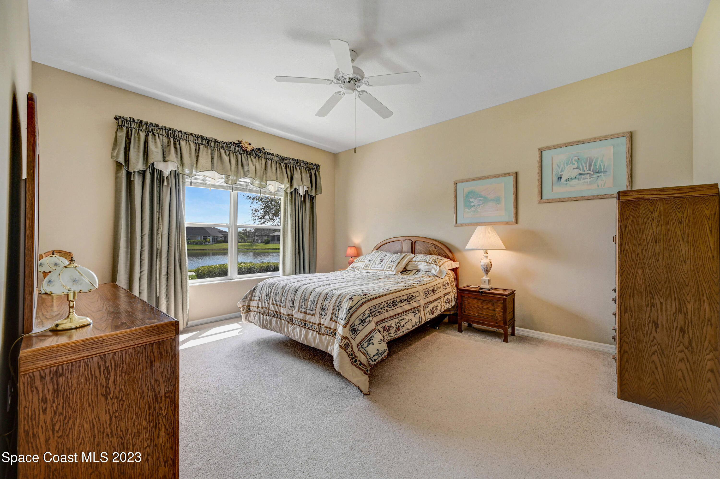 3341 Funston Circle Melbourne, FL 32940 - Photo 19 of 61 a bed room with a bed and a couch