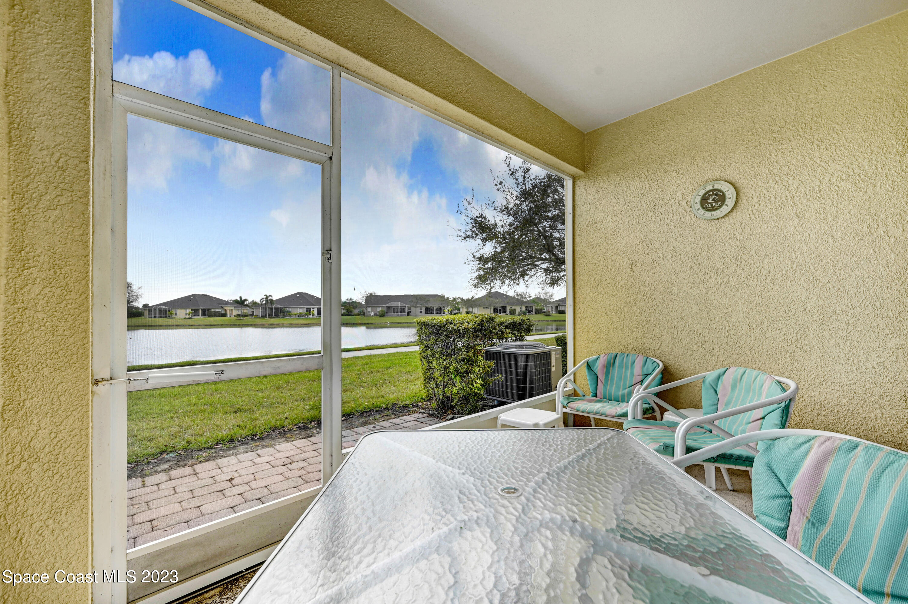3341 Funston Circle Melbourne, FL 32940 - Photo 29 of 61 a view of a porch with furniture and garden