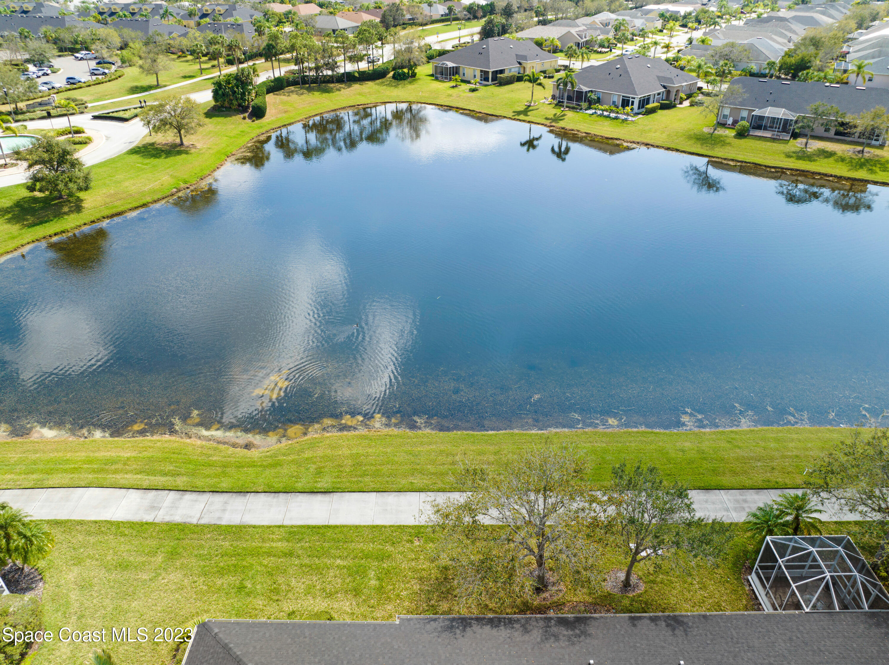 3341 Funston Circle Melbourne, FL 32940 - Photo 51 of 61 a view of an ocean house a yard and lake view