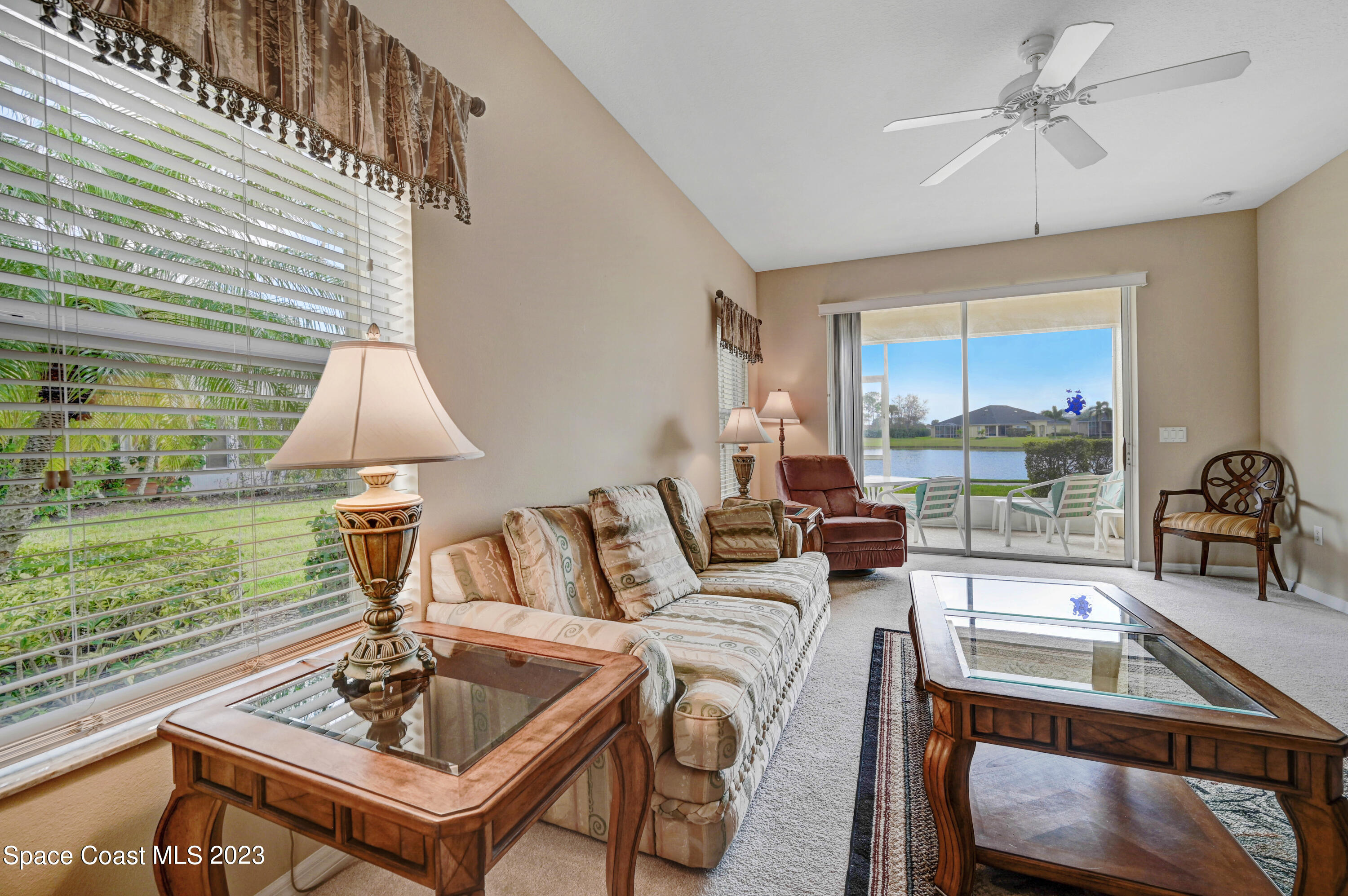 3341 Funston Circle Melbourne, FL 32940 - Photo 10 of 61 a living room with furniture and a large window