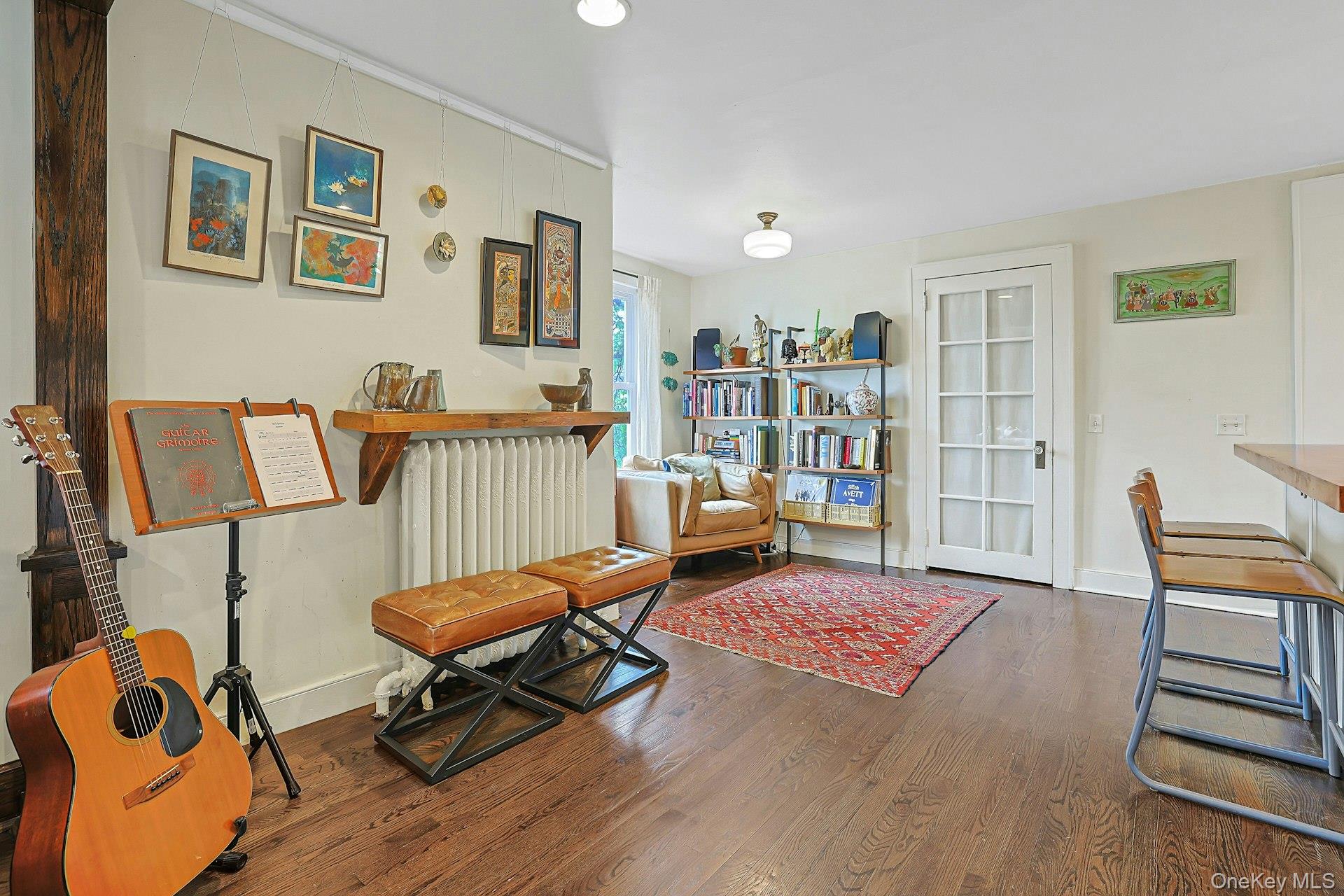 41 Clinton Avenue Ossining, NY 10562 - Photo 12 of 44 a living room with furniture and a book shelf